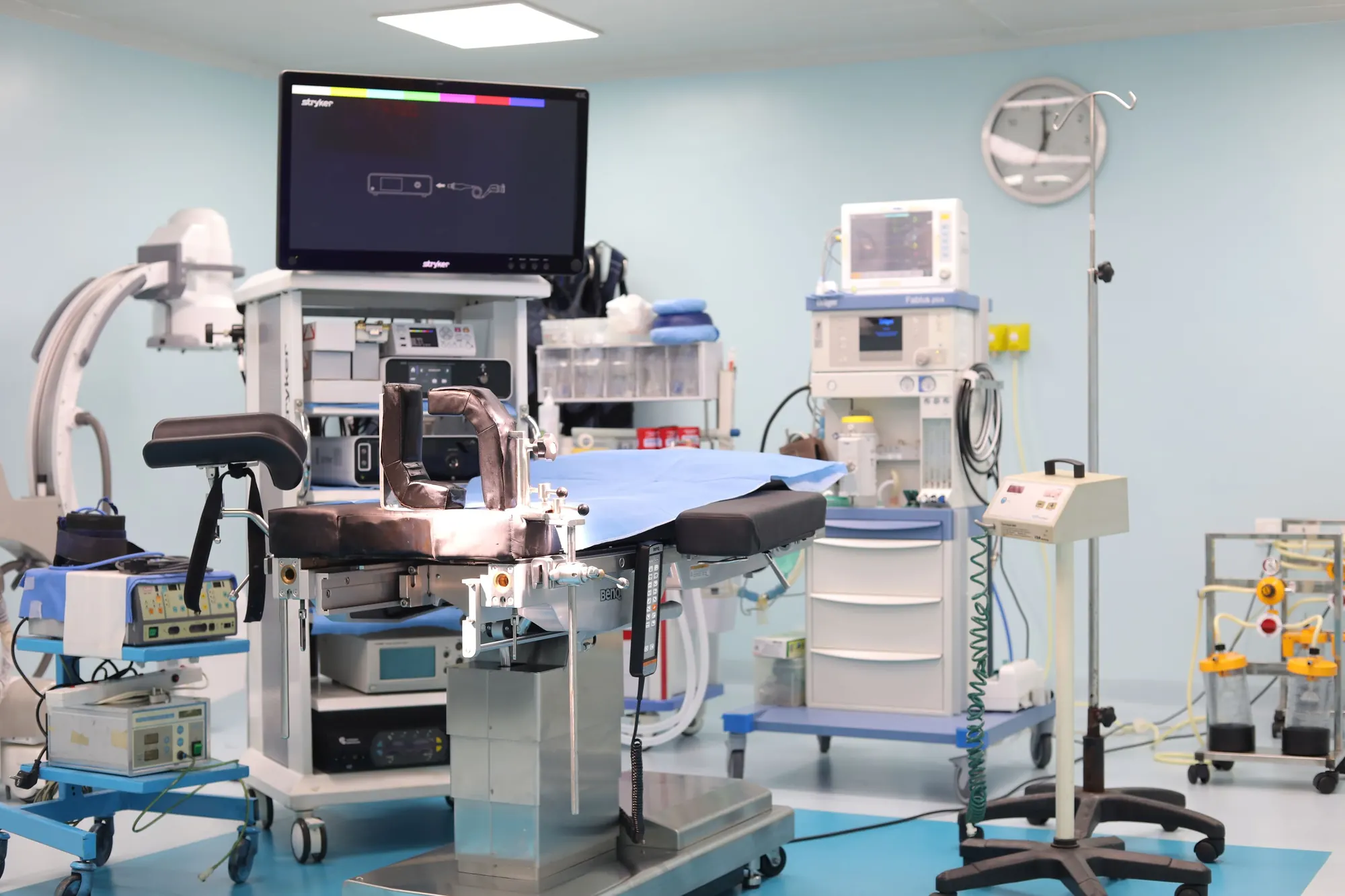 A fully equipped operating theatre with monitoring, anaesthesia and imaging equipment